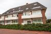 Langeoog Ferienwohnung Us Langeoog - Meeresstern - Außenansicht Pfeil