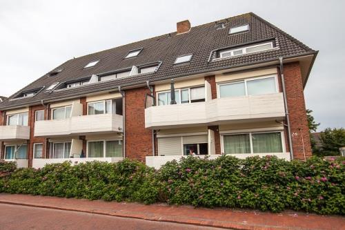 Langeoog Ferienwohnung Us Langeoog - Meeresstern - Außenansicht Pfeil