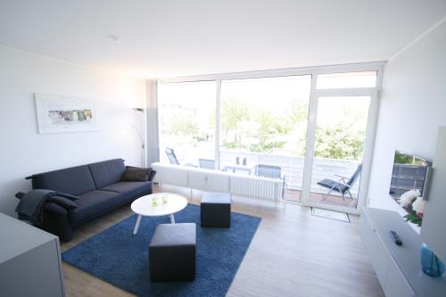 Langeoog Ferienwohnung Us Langeoog - Barkhausenstraße - Mey - Mey Wohnzimmer