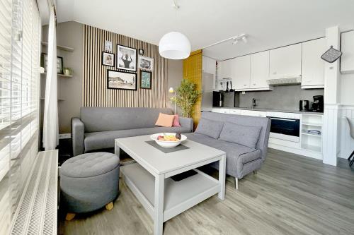 Langeoog Ferienwohnung Us Langeoog - Sonnendeck - Sonnendeck Wohnzimmer 02